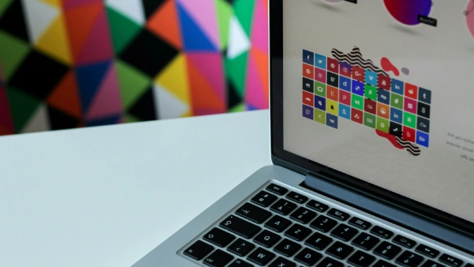 silver laptop computer with assorted logo screengrab